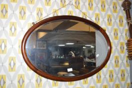 Mahogany Framed Oval Bevelled Edge Wall Mirror