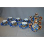 Japanese Kutani Dragon Pattern Twenty One Piece Tea Set with Geisha Girl Bases