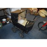 Edwardian Rexine Bodied Pram with Composition Body Doll