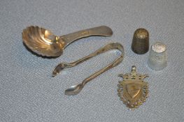 Bag of Small Silver Items; Caddy Spoon, Tongs, Thimbles, Fob - Approx 37g
