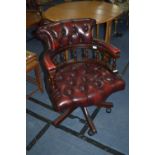 Burgundy Leather Buttoned Captains Chair