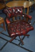 Burgundy Leather Buttoned Captains Chair