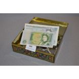 Tin Containing Two British £5 Banknotes, £1 Banknote and Assorted British Copper and Silver Coinage