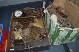 Two Boxes Containing Clock Movements and Spare Parts