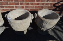 Pair of Reconstituted Limestone Urns on Plinths wi