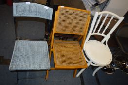 Two Wicker Folding Chairs and One Painted Bentwood