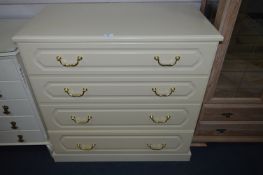 Cream Melamine Four Height Chest of Drawers