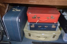 Four Assorted Vintage Suitcases