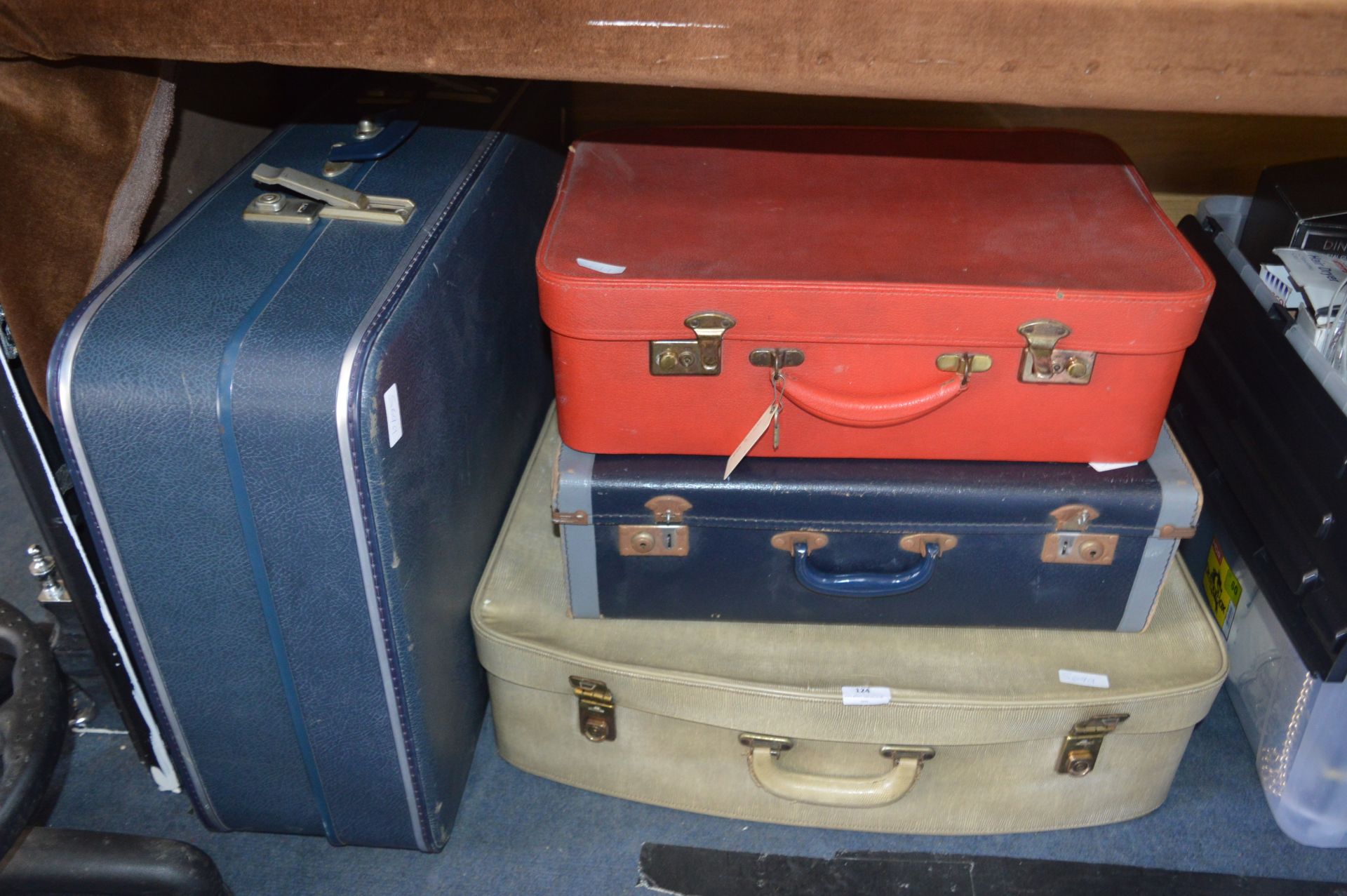 Four Assorted Vintage Suitcases