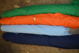 Four Rolls of Assorted Fabrics