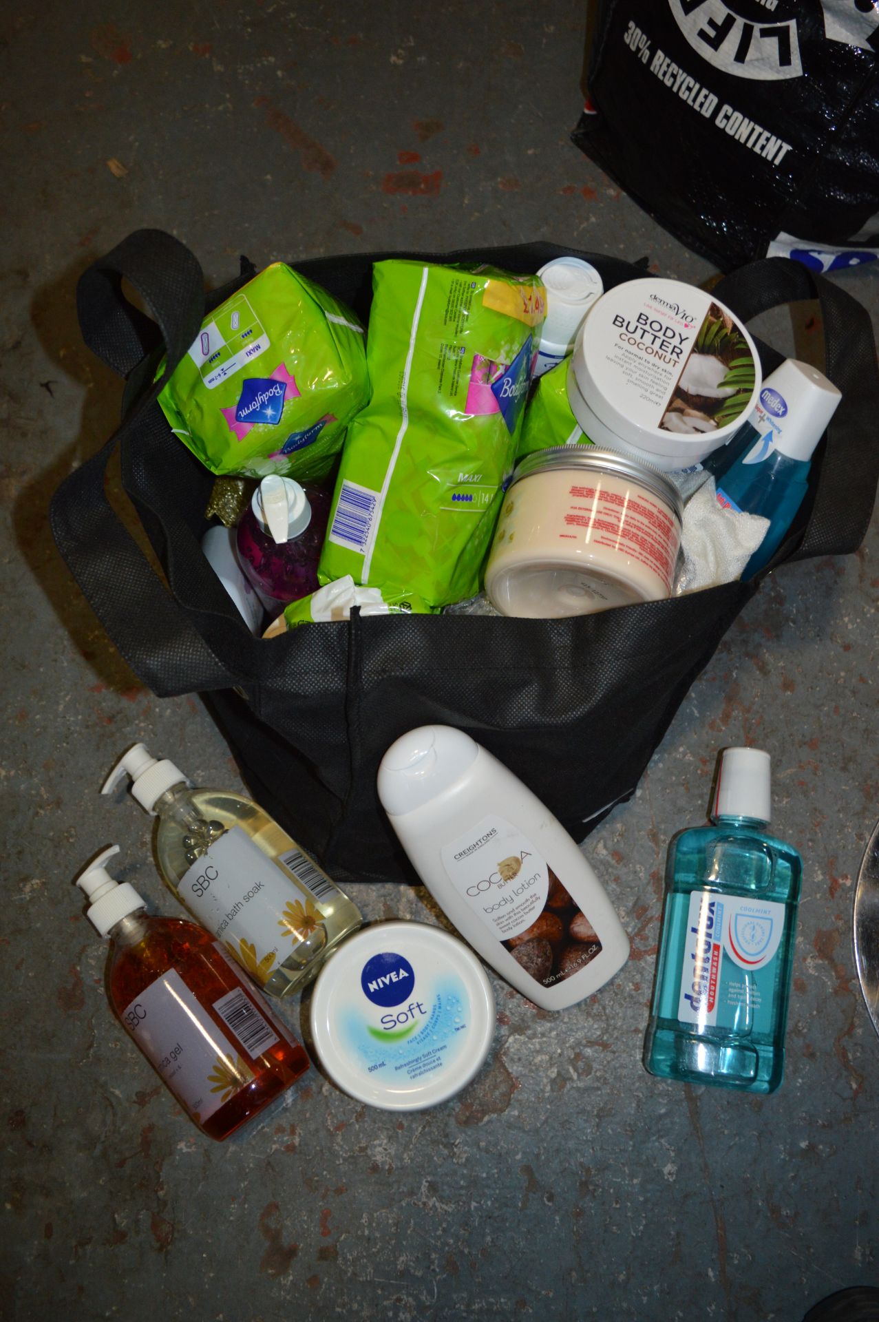 Bag of Toiletries Including Body Butter, Lotion, e