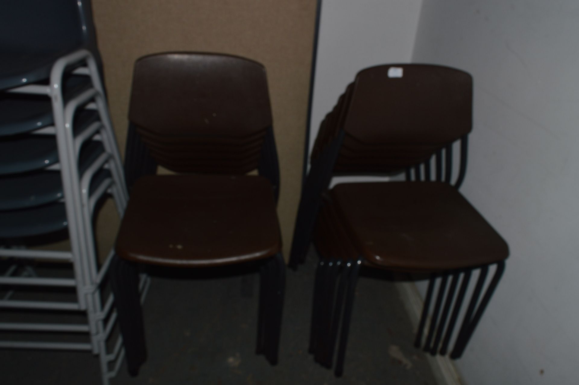 *Twelve Brown Stackable Plastic Chairs