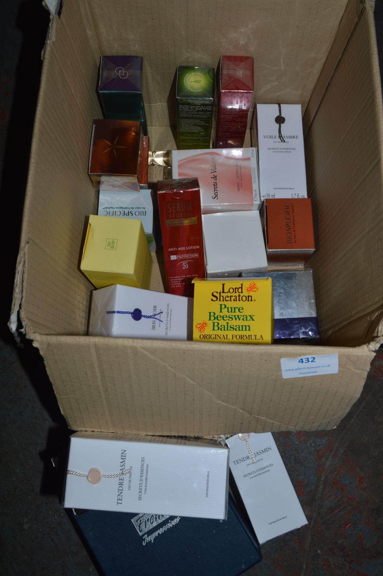 Box of Perfume and Beauty Products