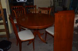 Circular Extending Dining Table with Six Chairs