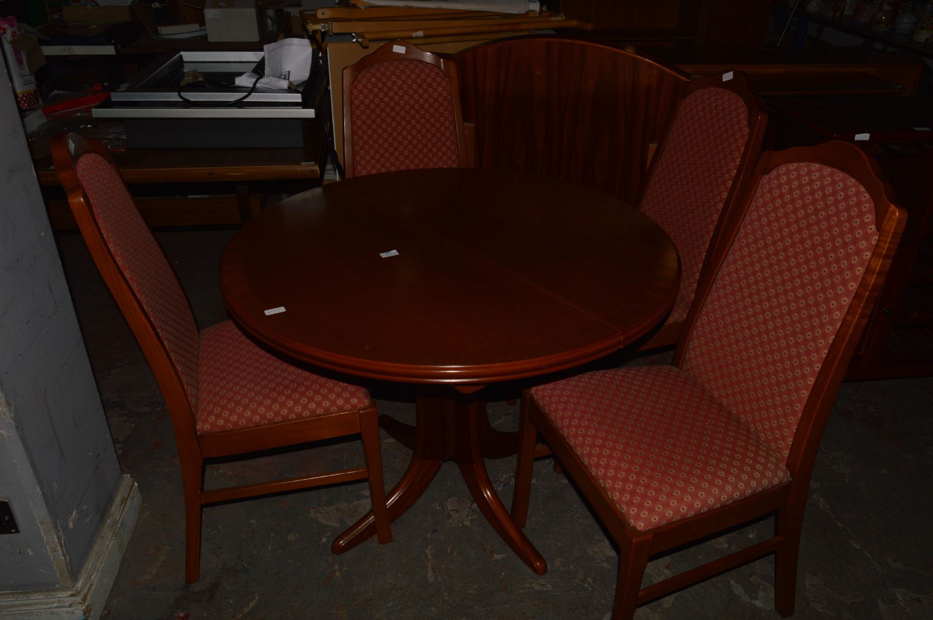 Circular Extending Dining Table with Four Upholste