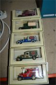 Five Collectible Diecast Metal Trucks in Boxes