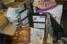 Four Stamp Albums and Two Bag of Foreign and Briti
