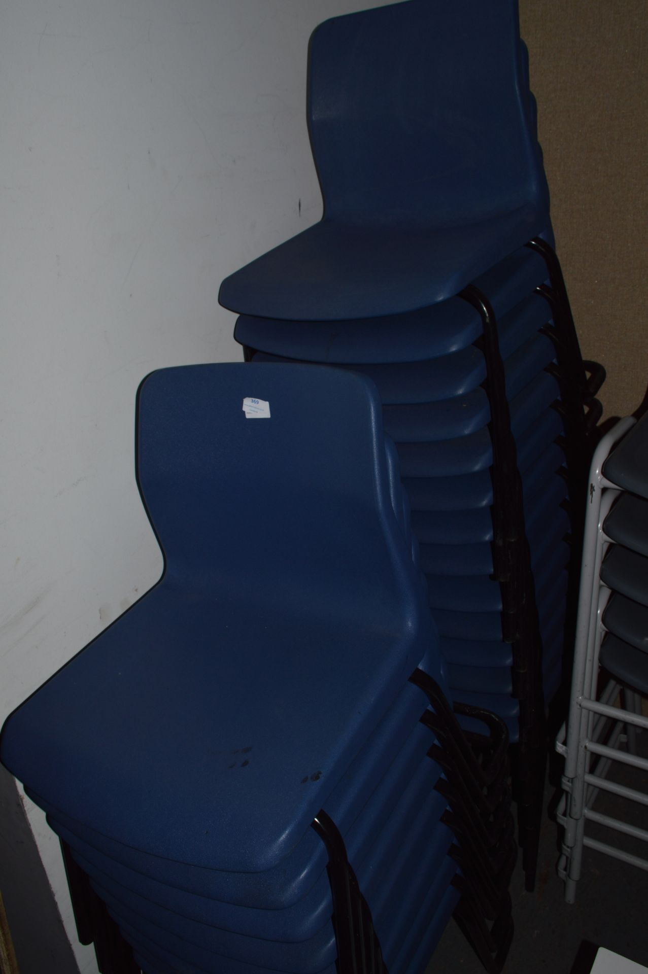 *Twenty Two Stackable Plastic Chairs