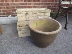 Three Oblong Stone Planters and a Plant Pot
