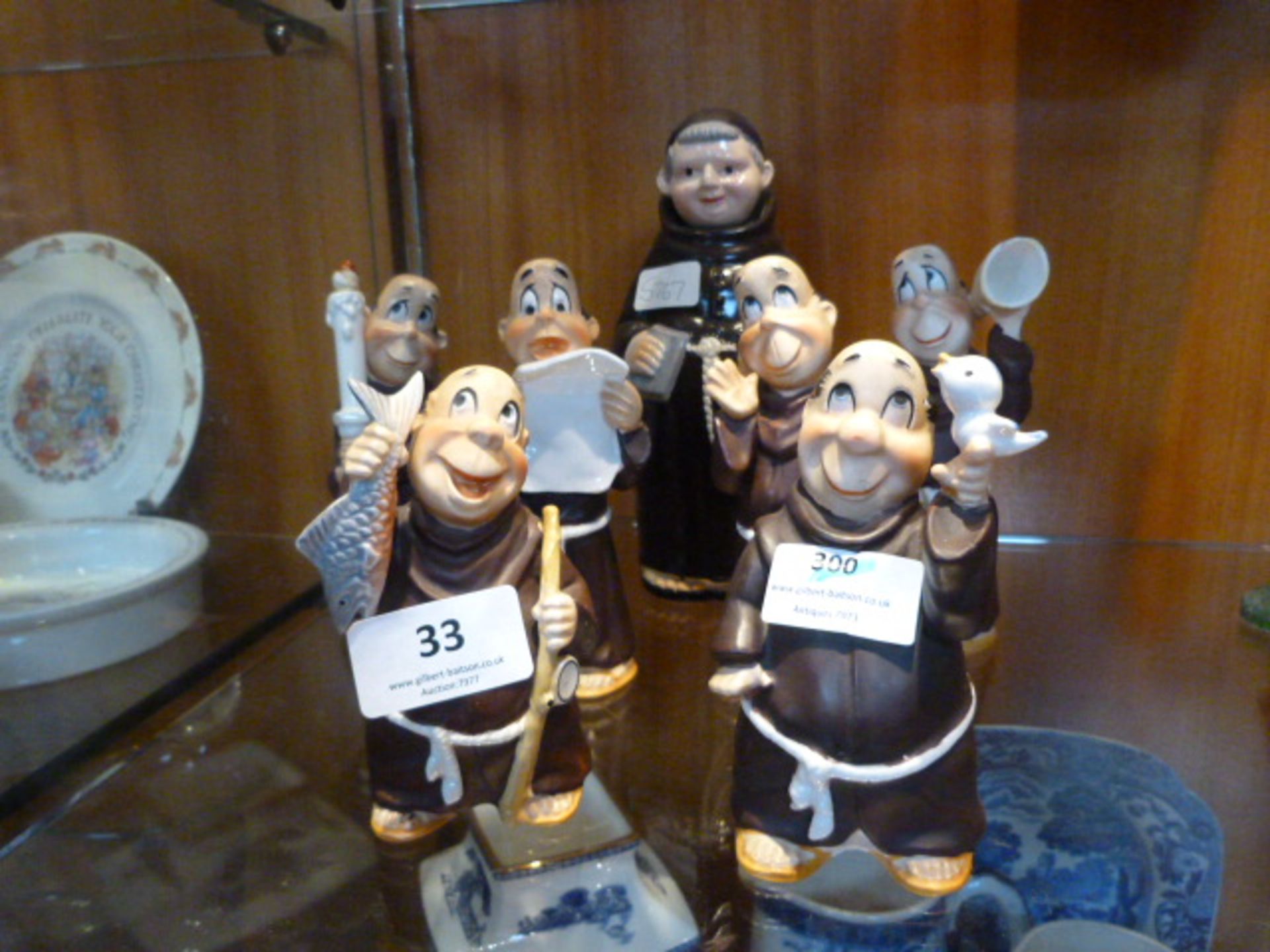 Seven Monk Figurines