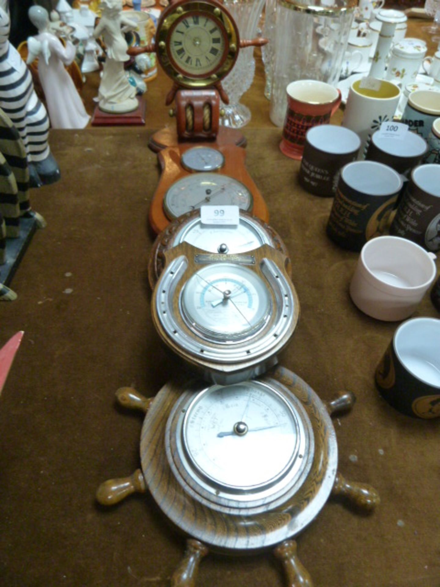 Four Wooden Barometers and a Nautical Clock