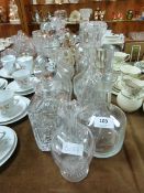 Ten Glass Decanters with Stoppers and One Other