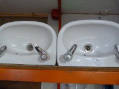 Two Small Sinks with Taps