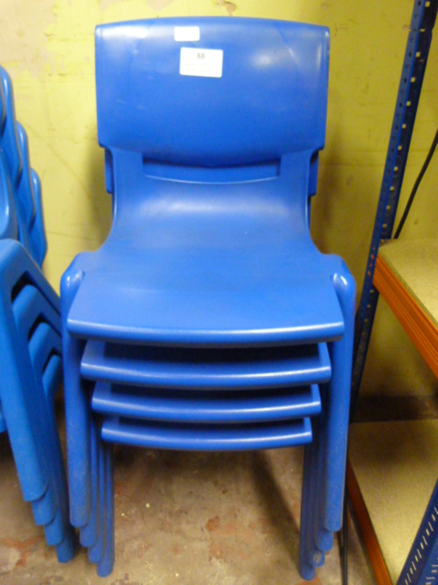 Four Stackable Plastic Children's Chairs