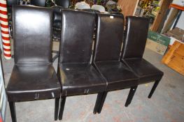 Four Black Leatherette Dining Chairs
