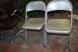 Two Chrome Folding Chairs