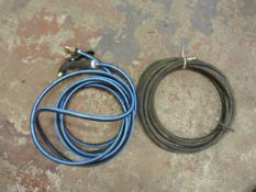 *Coil of Air Hose and a Water Sprayer