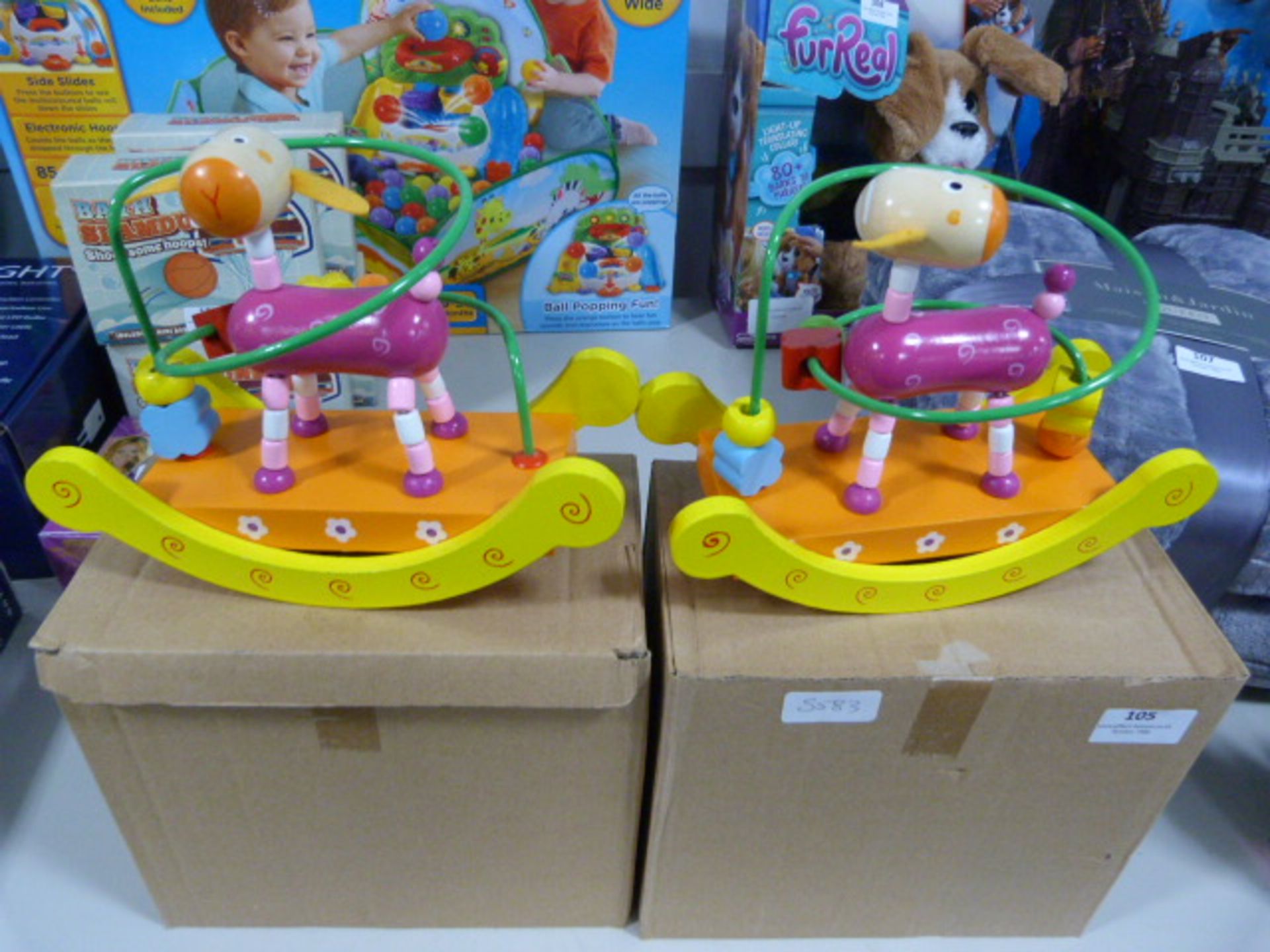 *Two Motoric Loop Rocker Wooden Toys