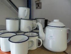 *Enamel Teapot and a Quantity of Enamel Mugs