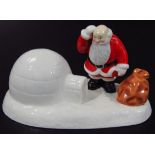 A Coalport Classics Father Christmas, Where's The Chimney, printed marks beneath, 10cm high.