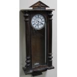 A late 19thC Gustav Becker walnut cased Vienna wall clock, the 18cm dia. dial with Roman numerals