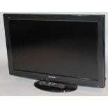 A Panasonic 32" colour television, in black trim, with remote control.