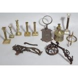 Various metalware to include 19thC and later brass candlesticks, a cast iron wall hanging sconce and