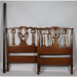 A 20thC Chippendale design mahogany single bed, with shaped pierced head and footboards and
