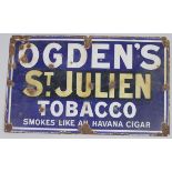 An early 20thC enamel metal sign Ogden's St Julien Tobacco Smokes Like An Havana Cigar, white type