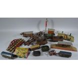 An early 20thC Hornby O-gauge tin plate train set, to include various stations, with bookstall, 34cm