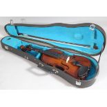 A 20thC Stentor Music Company Limited practice student violin, with polished case, ebonised mounts