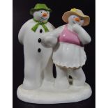 A Coalport Characters The Snowman figure group, The Bashful Blush, 15cm high. (boxed)