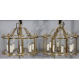 A pair of brass hanging lanterns.