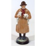 A Royal Doulton figure Lambing Time, HN1890, printed marks beneath, 23cm high. (second)