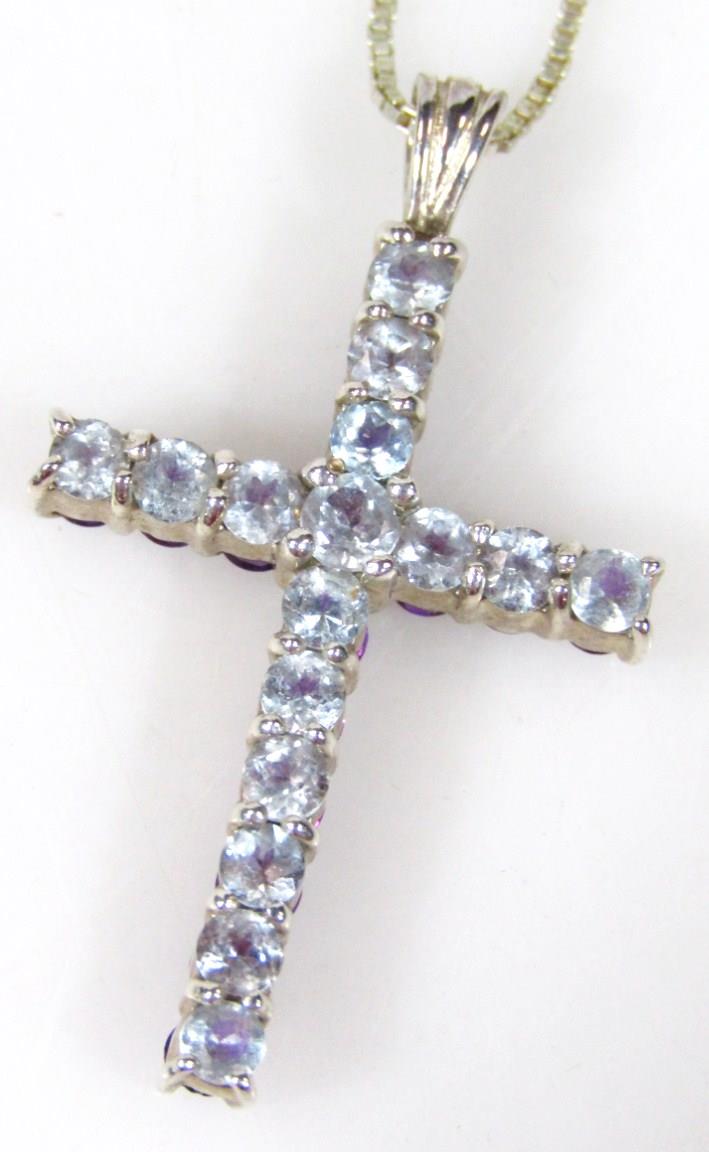 A silver stone set crucifix pendant, on a box link silver chain, a crucifix set with purple - Image 2 of 2