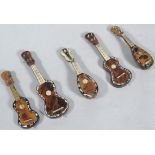 Five early 20thC mother of pearl tortoiseshell miniature musical instruments, to include mandolin,