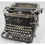 An early to mid 20thC Continental typewriter, with articulated keys, in black with chrome trim, 30cm