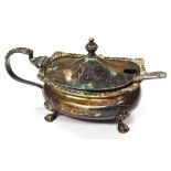 A George V silver mustard pot, of compressed bellied outline, with an upper gadrooned border,