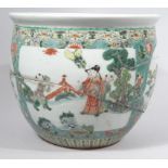A 19thC Chinese porcelain Kangxi style jardiniere, in famille vert palette, decorated with panels of