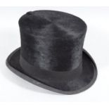 An early to mid 20thC top hat, in black, by Allen & Son, Harrogate, 15cm high, interior